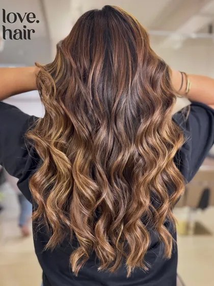 The full back view of this stunning, long balayage, perfect for a client who wants a natural but impactful look.