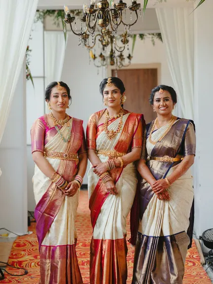 A beautiful portrait of three sisters, each with a unique, elegant look. I tailored the makeup for each of them to complement their sarees and personal styles.
