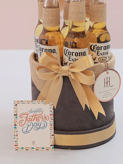 A closer look at the Corona beer hamper for Father's Day, showing the custom gift card and the neat arrangement of the bottles.