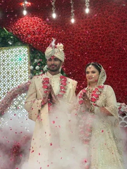 Showered in blessings and flower petals, Arihant and Jagriti stand together. Their wedding was a beautiful celebration of shared values and a shared vision for the future.