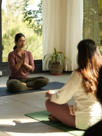 Leading the class in a moment of quiet intention before we begin to move. Setting an intention helps to ground the practice and bring mindfulness to our movements.