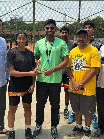 Presenting an award to a dedicated player at the conclusion of our summer camp. My goal is to develop skilled basketball players and build character.