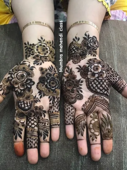 The final look of this intricate party mehendi.