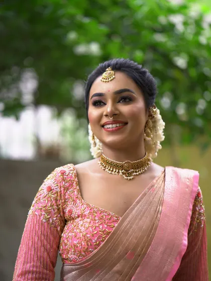 A candid, happy moment. The natural lighting shows how the makeup looks fresh and beautiful both indoors and outdoors.