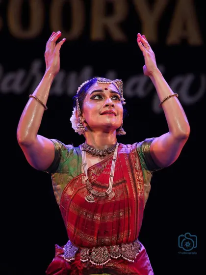 A gesture of offering and devotion, captured with beautiful lighting.