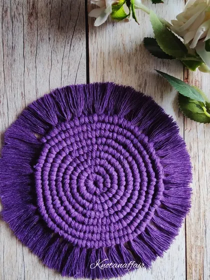 This pretty purple macrame round coaster is a perfect handmade decor piece. Use it for your vases, candles, or your favorite mug.