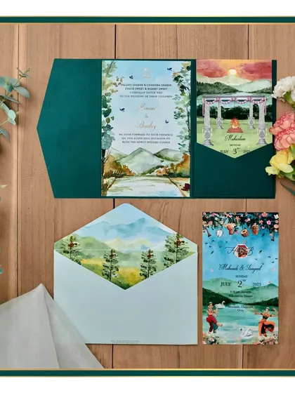 A watercolor invitation designed for a wedding in the hills. The suite features hand-painted landscapes on the main card, inserts, and envelope liner, creating a cohesive and scenic story.