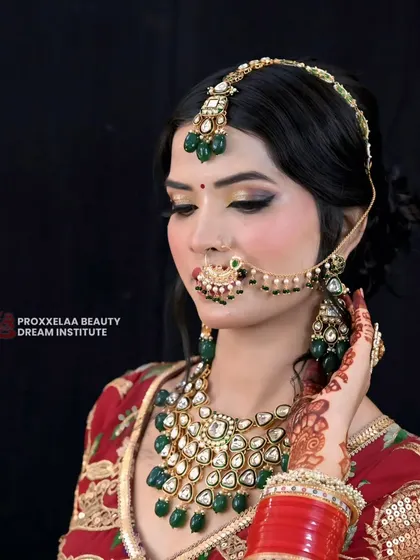 A softer, more demure pose. The makeup looks just as stunning from this angle, highlighting the smooth, airbrushed-like finish of the skin.