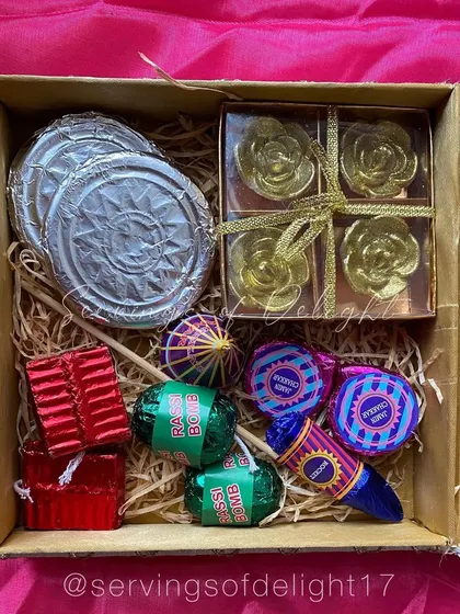 An example of a custom Diwali hamper, featuring my edible rassi bomb and chakra chocolates, along with other beautiful, themed treats.