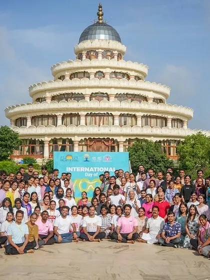A large group photo after a successful International Day of Yoga celebration. The smiles and sense of community are a testament to the shared joy and positive energy generated during our events.
