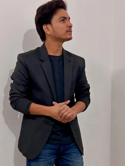 A confident pose in a blazer. I believe in dressing for the attitude you want to embody, whether on stage or in life.