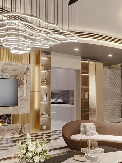 A closer look at the TV and fireplace unit in our curved living room. The design uses book-matched marble and a modern fireplace to create a stunning focal point that is both warm and luxurious.