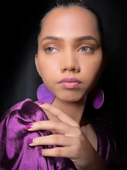 A perfect example of a 'no-makeup' makeup look. The skin is even and glowing, and the features are subtly defined, making it ideal for commercial and beauty work.