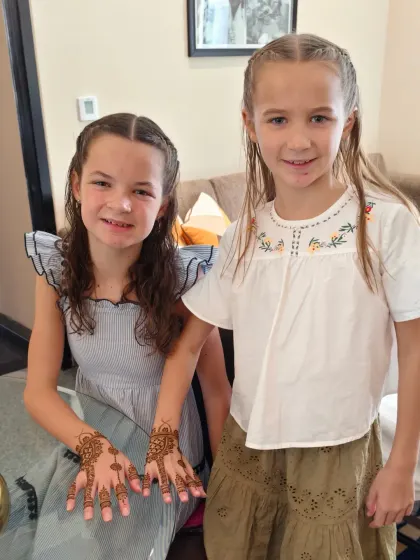 These two pretty girls from the UK were so happy with their matching mehndi designs.