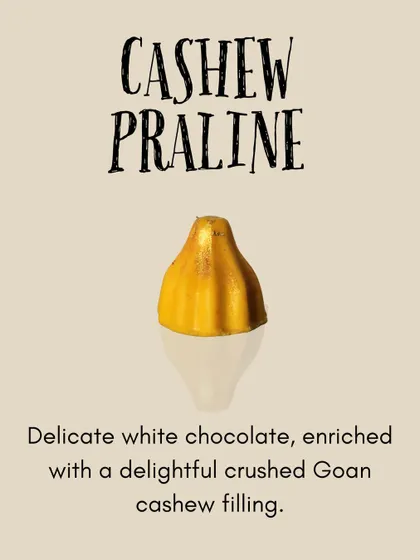 Our Cashew Praline modak is a tribute to local flavors, with a white chocolate shell and a filling of crushed Goan cashews.