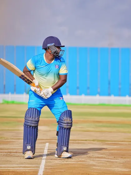 Coach Sandeep looking sharp and ready at the crease, embodying the player-coach spirit of our academy.