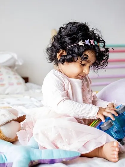 A quiet moment of play for this little girl and her favorite truck. I always encourage including your child's special toys to make the photos even more personal.