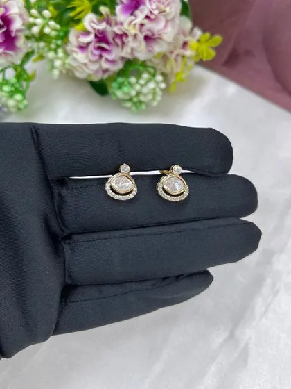 A close-up of the simple yet elegant stud earrings that come with our lightweight necklace sets. These are perfect for daily wear.