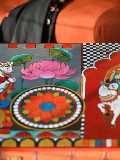 Another perspective on the side panel, showing the interplay of color and form. The combination of the Yali, the lotus, and geometric borders creates a rich visual texture.