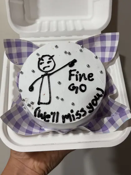 A funny farewell bento cake with the message "Fine go (we'll miss you!)". These cakes are great for inside jokes and personal messages.