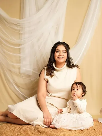 A beautiful mother and daughter portrait. The simplicity of the setting allows their connection and loving expressions to shine through.