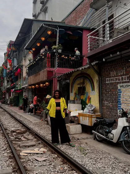 The famous train street in Hanoi. This black and yellow outfit was perfect for a day of urban exploration. I believe in dressing for the destination.