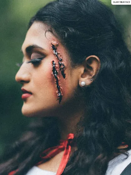 A profile view of the SFX scar makeup, highlighting the realistic texture and coloring of the prosthetic.