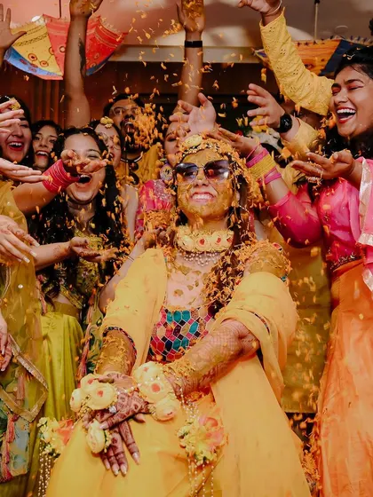 Pure joy and chaos at Pragya's haldi ceremony. These are the moments you'll look back on and laugh about for years. My goal is to be right in the middle of the fun, capturing the genuine smiles and playful moments with friends and family.