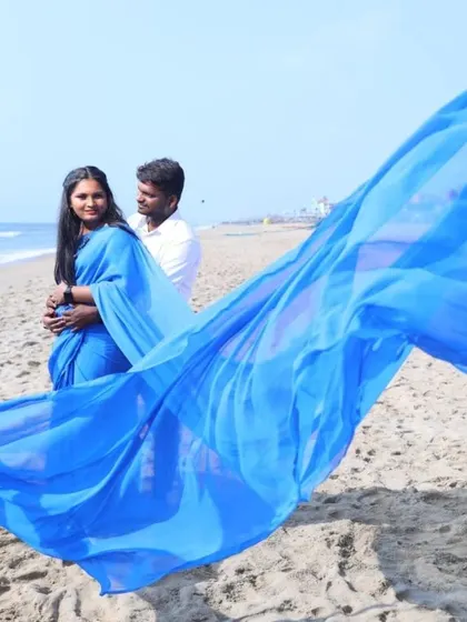 Another angle of the blue flying saree on the beach, showing how the long trail can be used to create so many different beautiful shots.