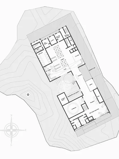 The floor plan for the community hall. The layout separates public gathering spaces from the private guest house areas, with the courtyard acting as a functional and social hub connecting the two.