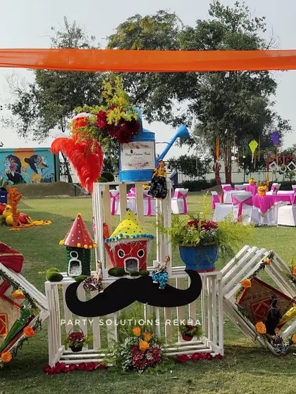A quirky photo booth setup for a fun-filled Mehendi. I used painted crates, a mustache prop, and other playful elements to create a spot where guests could let loose and capture fun memories.
