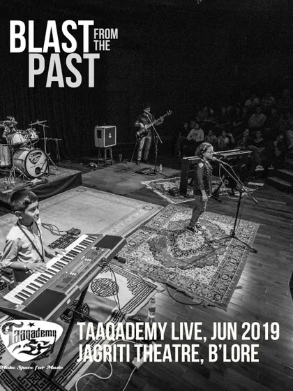 A throwback to Taaqademy Live at the beautiful Jagriti Theatre in 2019. This black and white shot captures the atmosphere of our student bands playing in a professional theatre setting.
