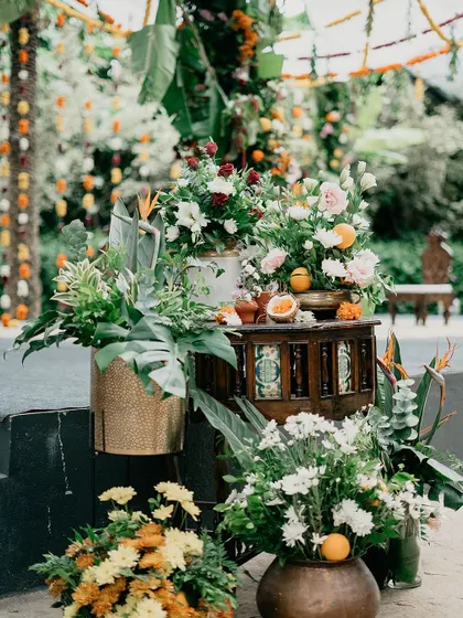 A lush and colorful floral arrangement, perfect for adding a touch of vibrancy to a wedding stage or entrance.