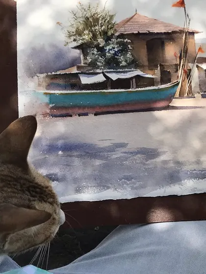 My new friend appears to be inspecting the final details of the painting. It was a memorable experience.