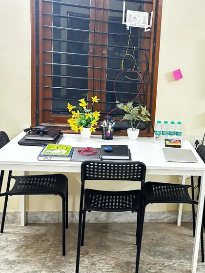 **The Beginnings of Our Bangalore Branch.** This is where it all starts. A simple desk and a clear vision. Setting up our Bangalore office, we are reminded of our startup journey and are excited to help others on theirs.
