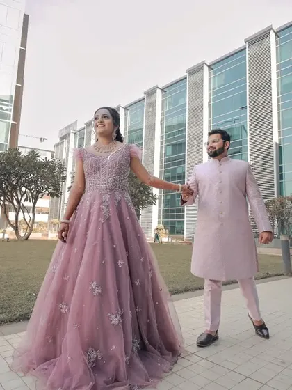 A playful "palat" moment captured in a modern urban setting. This shot combines a fun, filmy reference with a chic, contemporary backdrop, showcasing our ability to blend different styles.