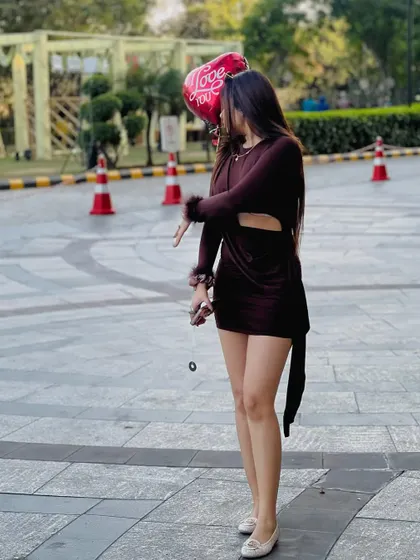 My Valentine's Day look. I skipped the traditional red for this chic brown cut-out dress, perfect for a modern romantic celebration.