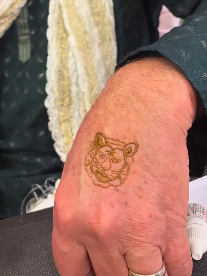 We love custom requests! This guest wanted a tiger face, and we were happy to create this unique and personal piece of art for him.