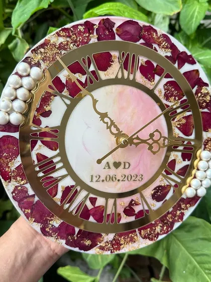 The combination of gold flakes, red rose petals, and a marbled base creates a unique and artistic keepsake. It's a smaller, more intimate version of my larger preservation clocks.