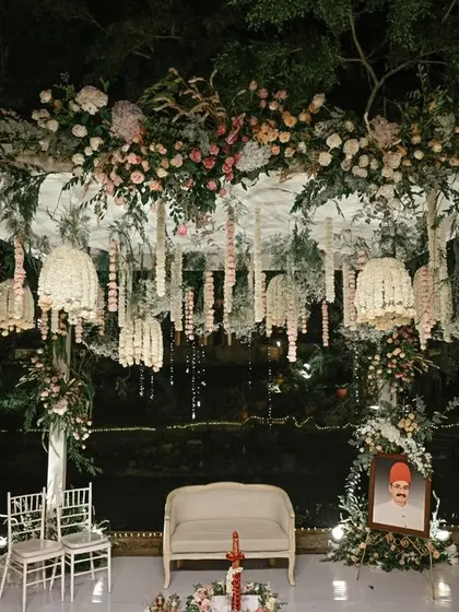 This elegant mandap is a fusion of contemporary and traditional design. We used a canopy of pastel florals and intricate hanging arrangements to create a dreamy, romantic space for the wedding ceremony.