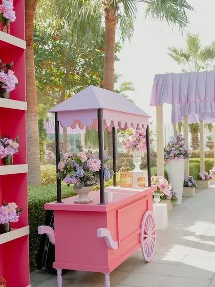 A charming cart filled with flowers and gifts, adding to the festive and generous spirit of the Mehendi ceremony.