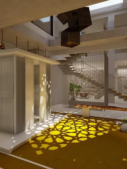 Looking through the courtyard, you can see the glass elevator and floating staircase. The play of light and shadow from the skylight creates dynamic patterns on the floor throughout the day.