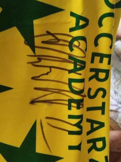 A close-up of Sunil Chhetri's signature on our jersey. This autograph represents a connection to greatness for our young, aspiring footballers.