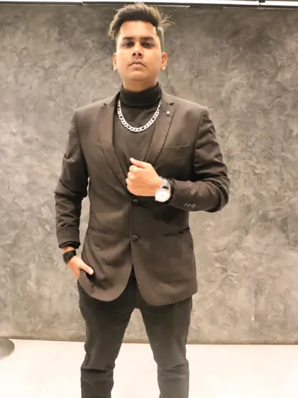 A shot from a professional photoshoot. I believe in presenting a stylish and confident image that matches the quality of my service.