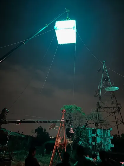 The moonbox rig for 'Kishkindhapuri' seen from a distance, showing its position relative to the set and other equipment like the camera crane.