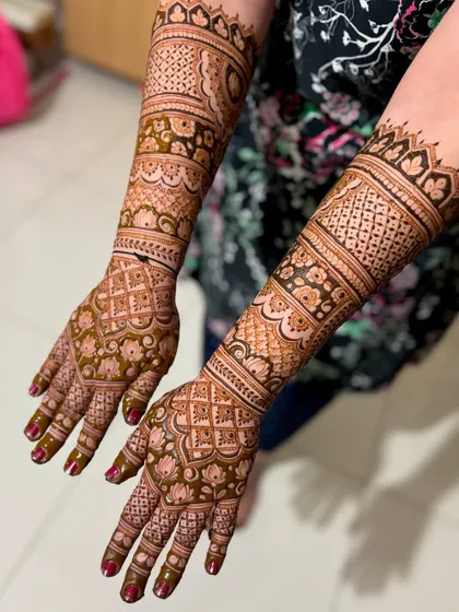 An intricate bridal mehendi for Chaitra, with a beautiful mix of floral, paisley, and geometric patterns.