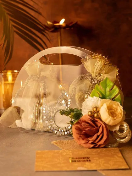 Another view of our modern Diwali gift bag. The transparent design allows the beautiful contents to be seen, creating an enticing and elegant presentation.