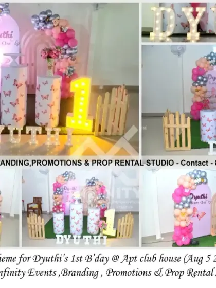 This butterfly theme for a first birthday at an apartment clubhouse features a lovely rainbow arch backdrop. The decor includes butterfly-themed cylinder props, a light-up number "1," and a soft pastel balloon garland.