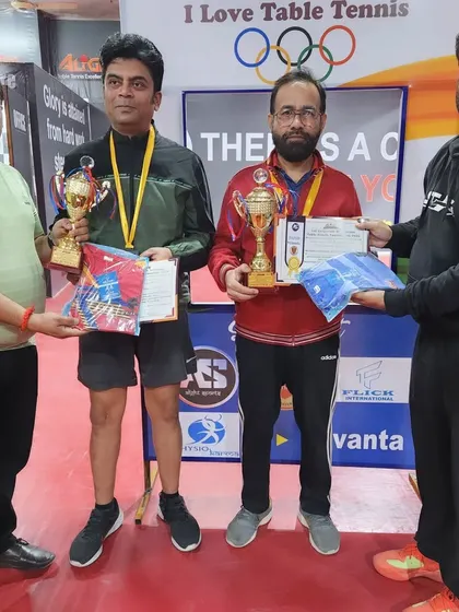 The finalists of a doubles category at our corporate tournament. Team events and doubles add another layer of strategy and fun to the competition.