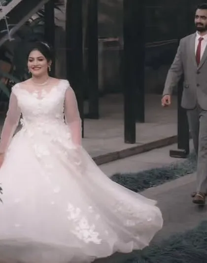 A classic post-wedding or reception look. I styled the bride in this elegant white ball gown with delicate floral details and created a sophisticated updo and makeup to match.